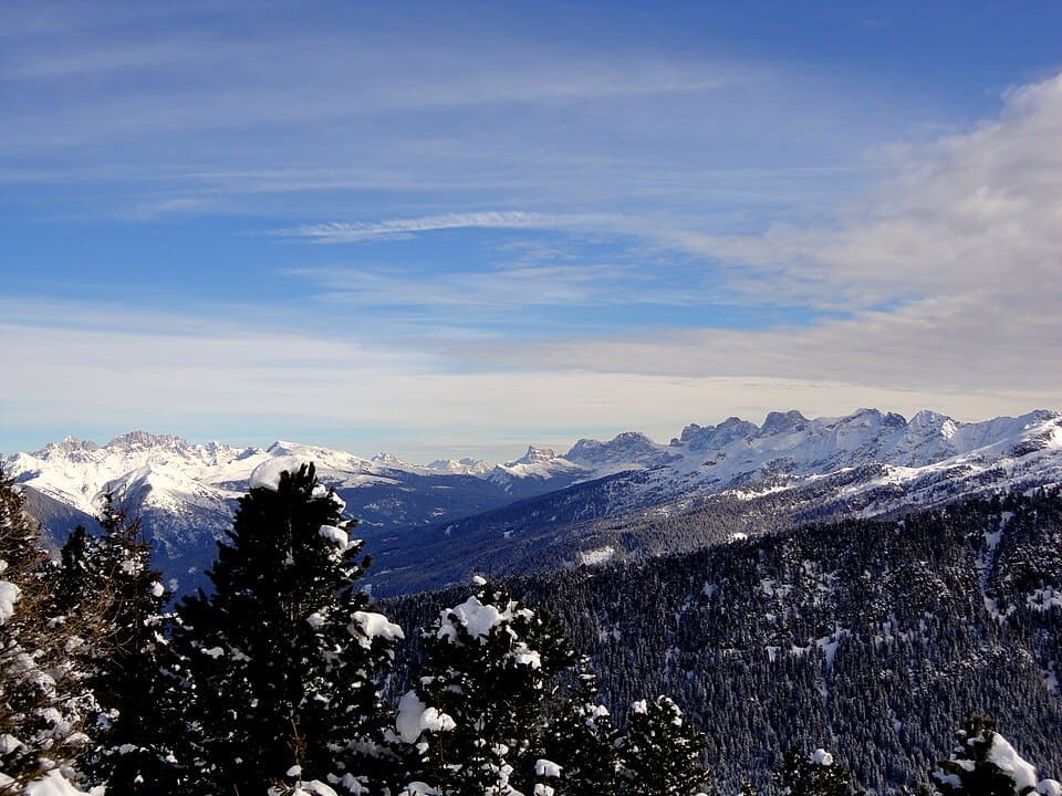 Panoramic winter view over the Alpe Cermis ski area and the Lagorai mountain chain