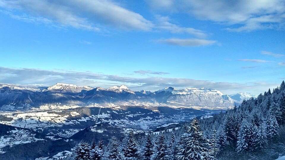 A view of the ski slopes and mountains at Le Collet d'Allevard in winter