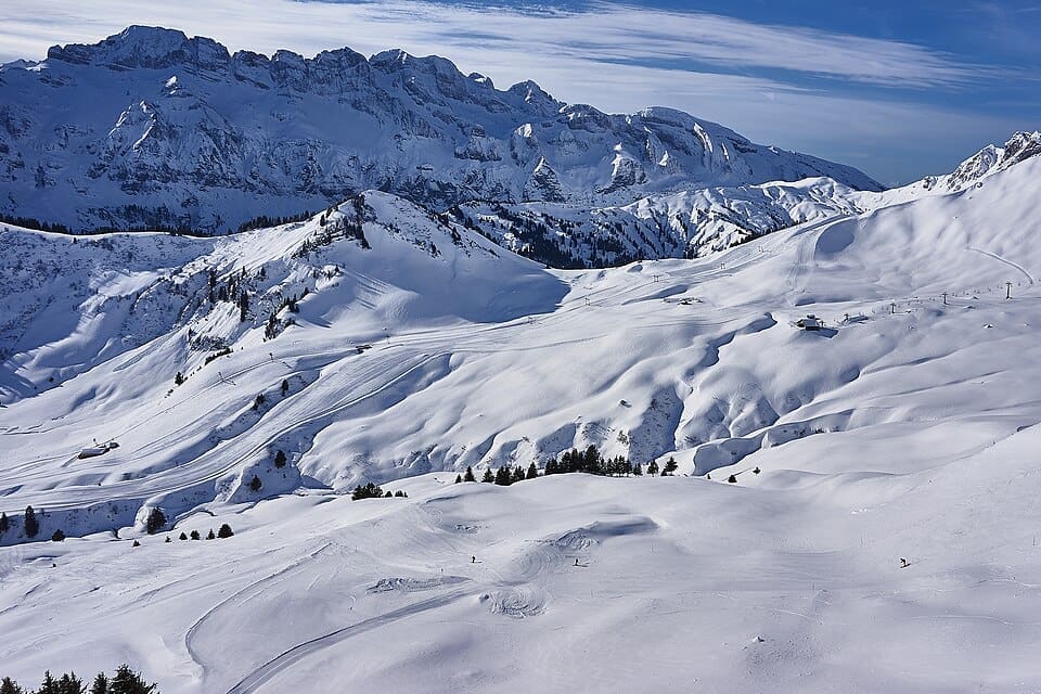 Panoramic view of Les Crosets village and ski slopes with Dents du Midi in the background