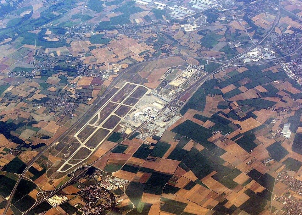 Aerial view of Lyon-Saint Exupéry Airport terminals and railway station