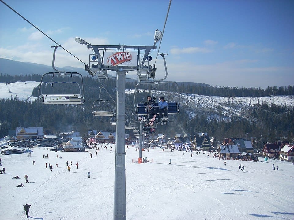 Ski lift and snowy slope in Małe Ciche
