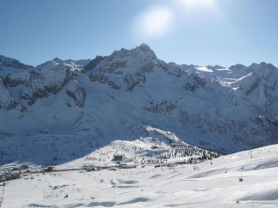 Wide view of Passo del Tonale ski slopes with the Presena Glacier in the background