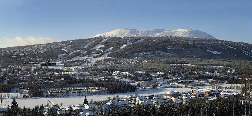 Trysil ski resort landscape showing groomed slopes rolling down through the pine forests
